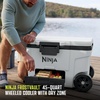 image:imageNinja FrostVault 45qt Cooler with Wheels Dry Storage Lakeshore Blue  Ninja FrostVaults 45qt capacity holds 68 cans keeps food cool amp dry and rolls easily on allterrain wheelsDaffodil Daze