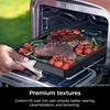 image:imageNinja Woodfire Cast Iron Pan for OO100 PreSeasoned High Heat Black  Ninja Woodfire Cast Iron Pan is preseasoned customfit at 12x12 great for searing and onepan meals for 4