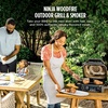 image:imageNinja Woodfire Pro Outdoor Grill with Builtin Thermometer OG751  Ninja Woodfire Pro Grill uses wood pellets amp electric power with a builtin thermometer for perfect noguesswork cooking7in1 GrillThermometer
