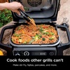 image:imageNinja XSKGRDPLT Woodfire Outdoor Flat Top Griddle Plate Compatible with Ninja Woodfire Grills OG700 series Ceramic Coating Insert BlackGrey  Ninja Woodfire Griddle Plate clicks into your grill for even edgetoedge searing and easyclean nonstick cooking146 x 11 x 22